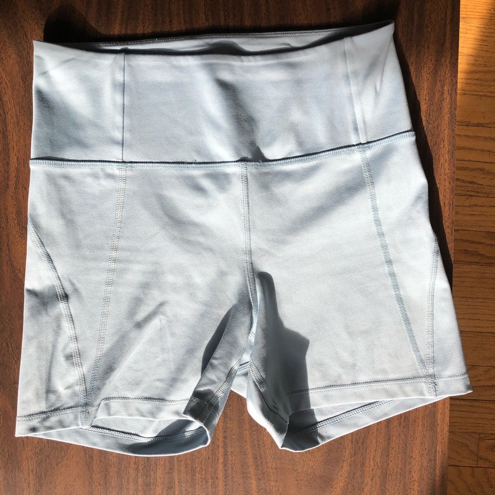 Girlfriend Collective high rise run short in Dew. Size medium.